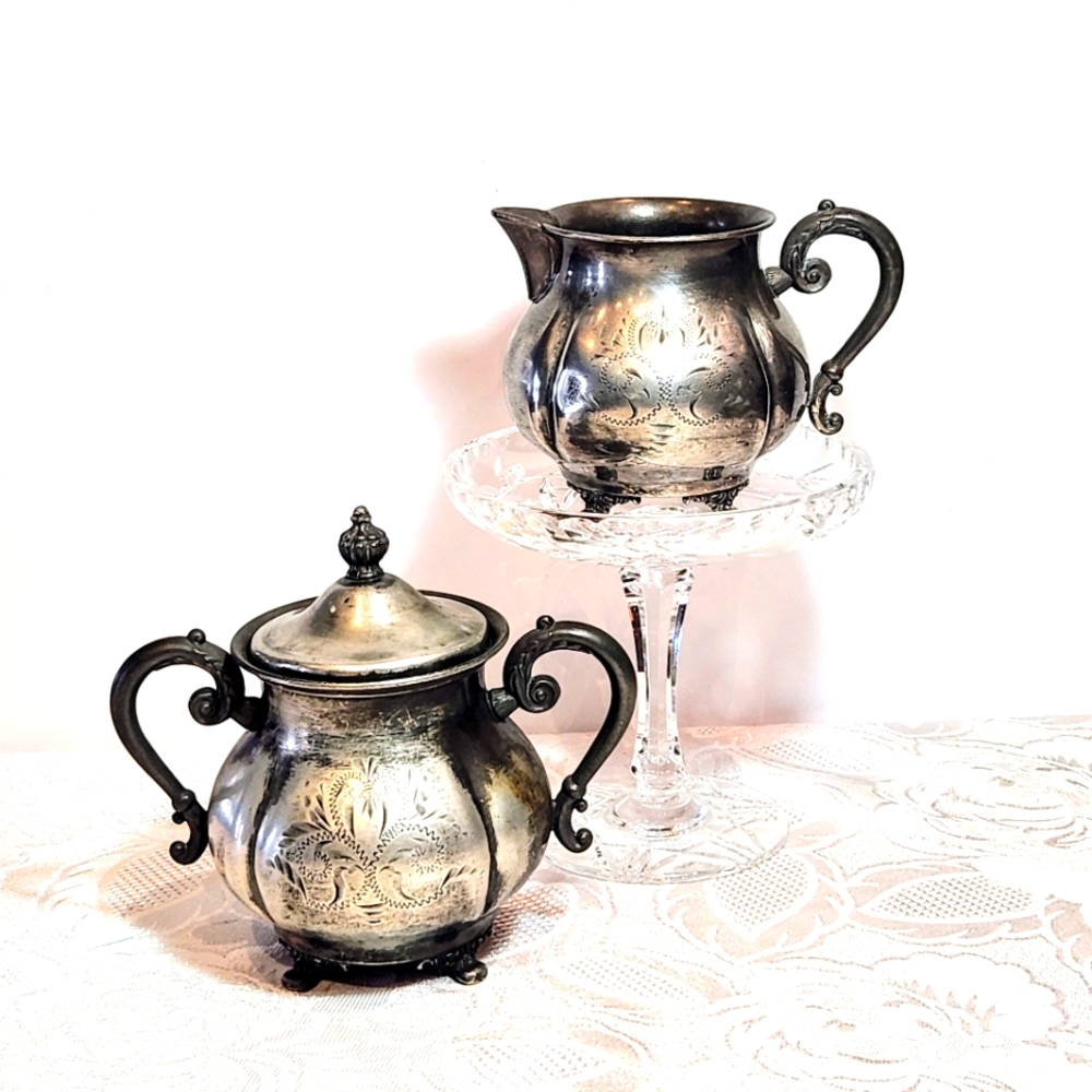Set Of 4×silver plated sugar and creamer set. By Van Bergh Rochester NY.
